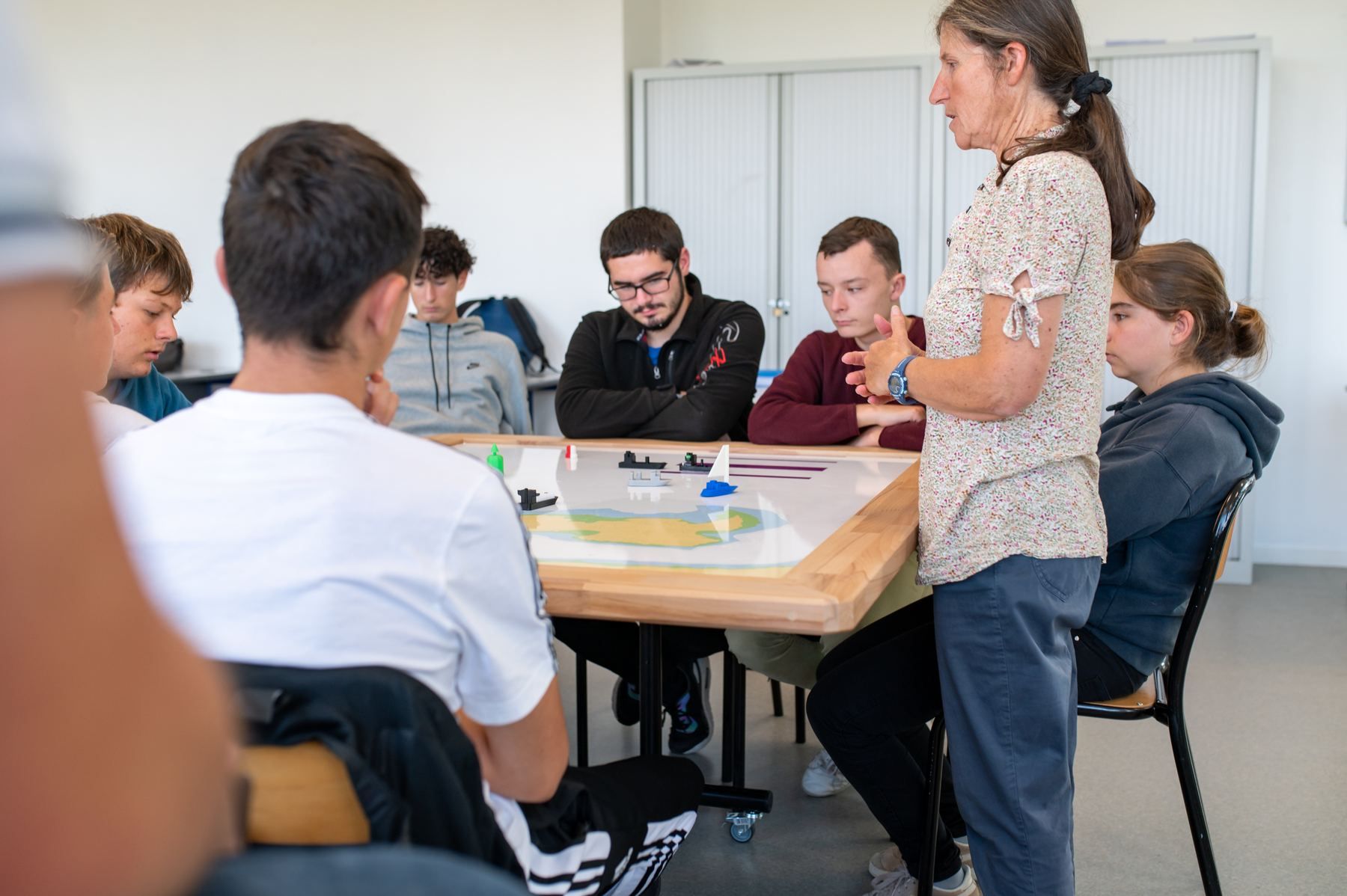 Instructor presenting a situation to the class