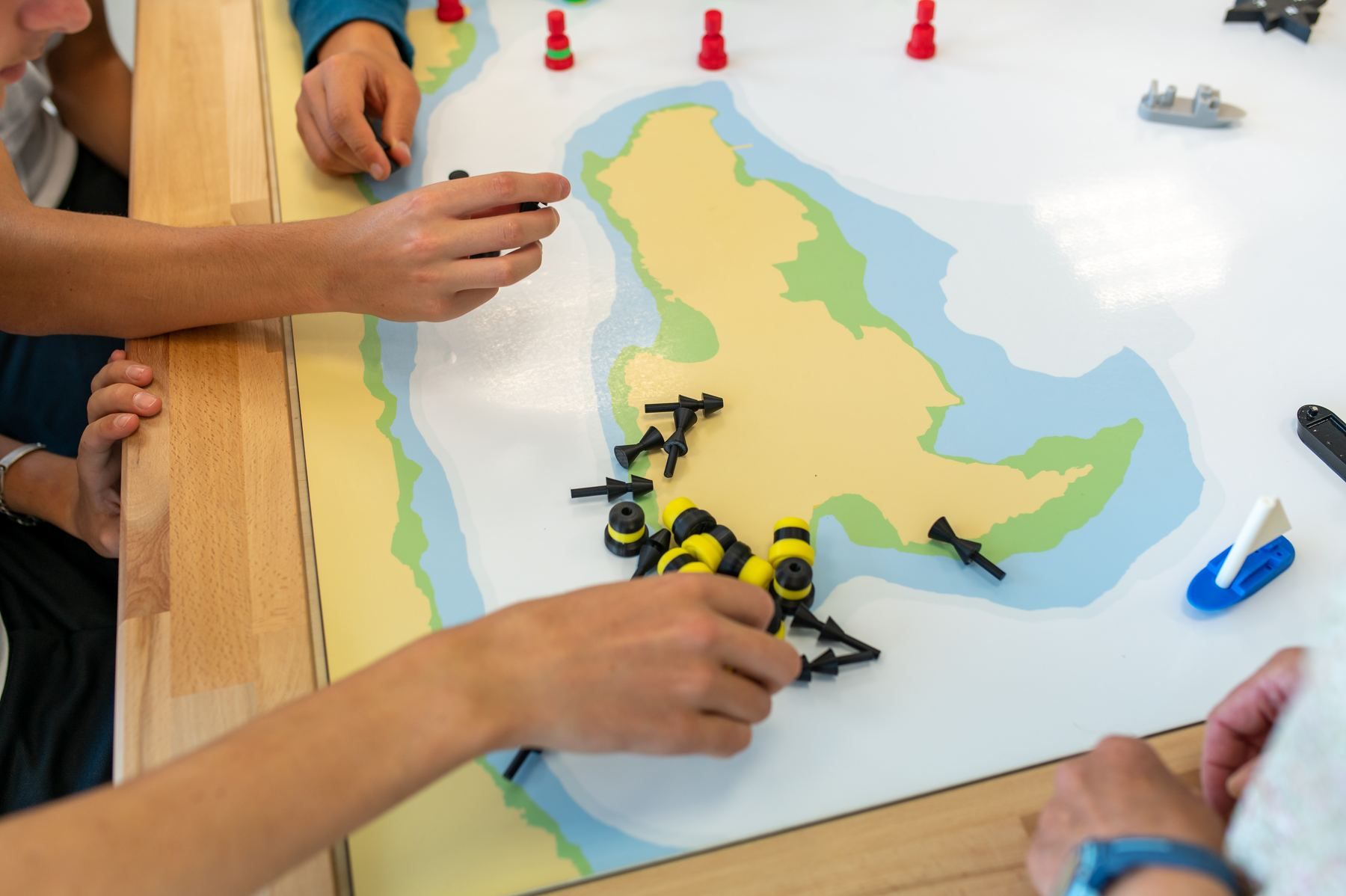 Yellow and black cardinal marks on the board's chart