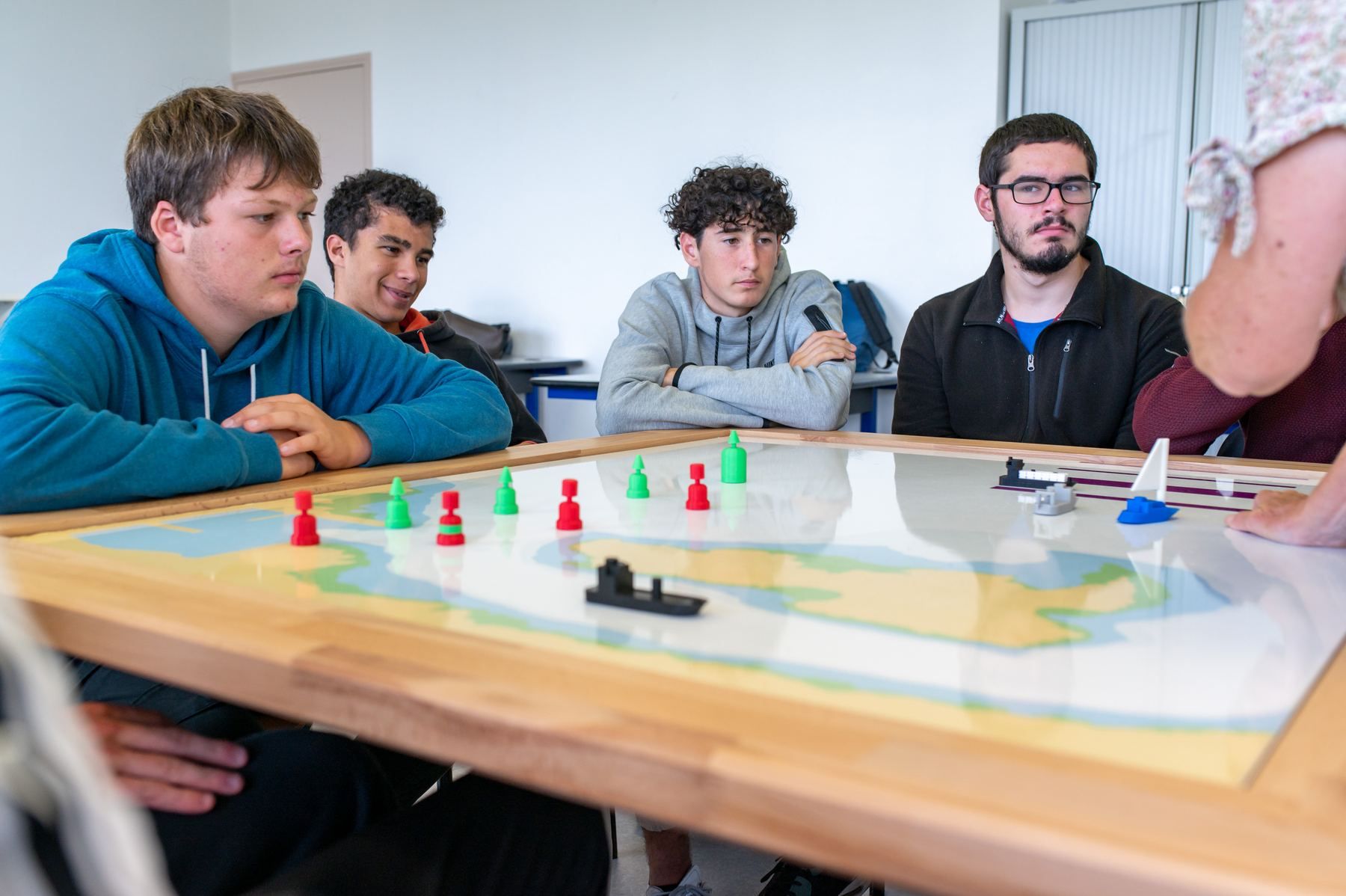 Students focused around the Learning table